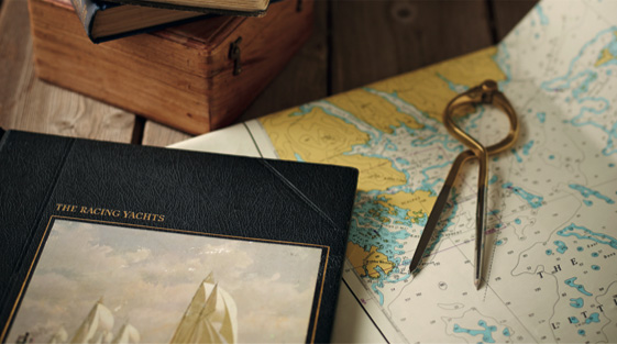 Racing yachts book and world map